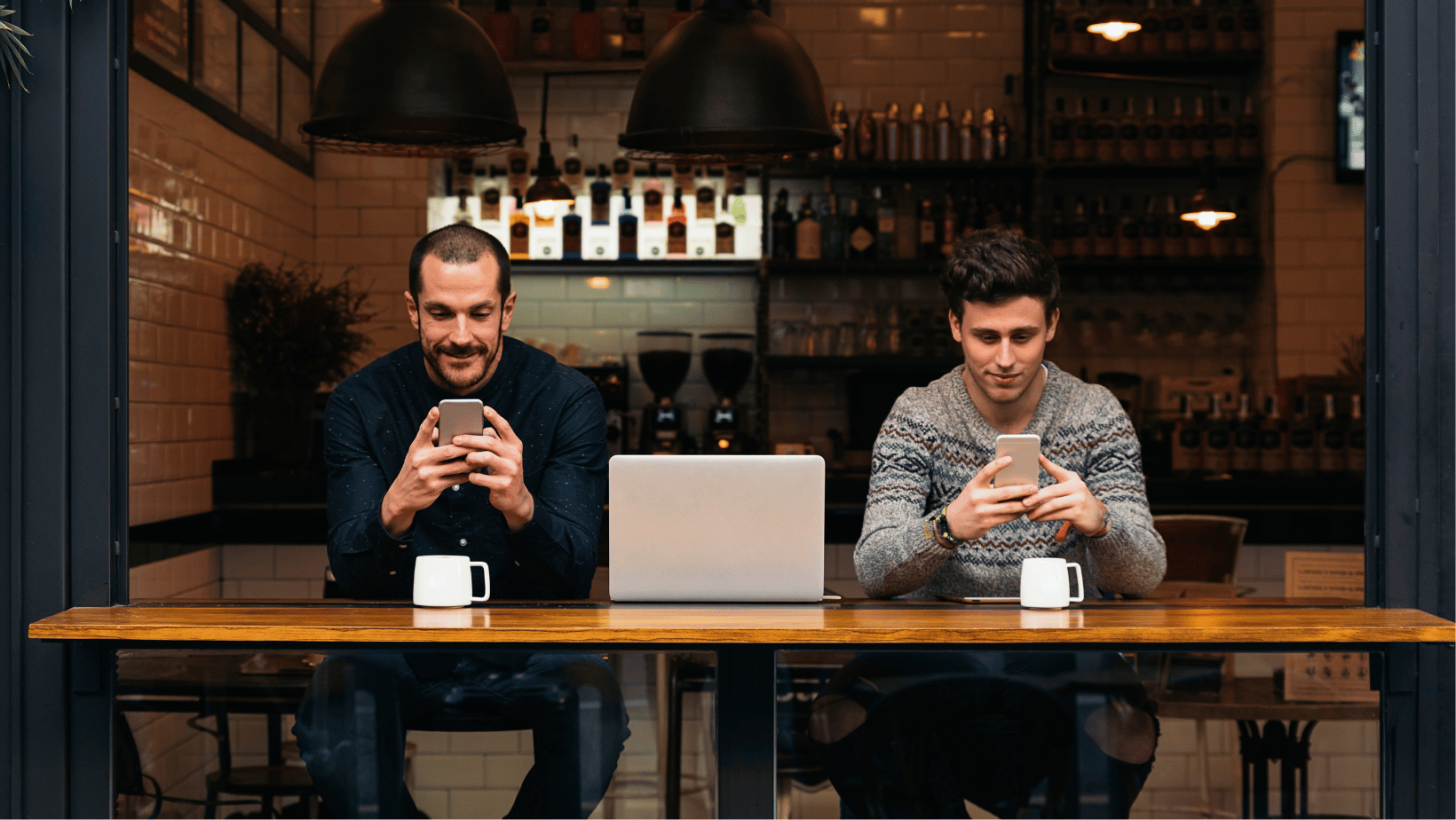 coffee shop customers using free wifi