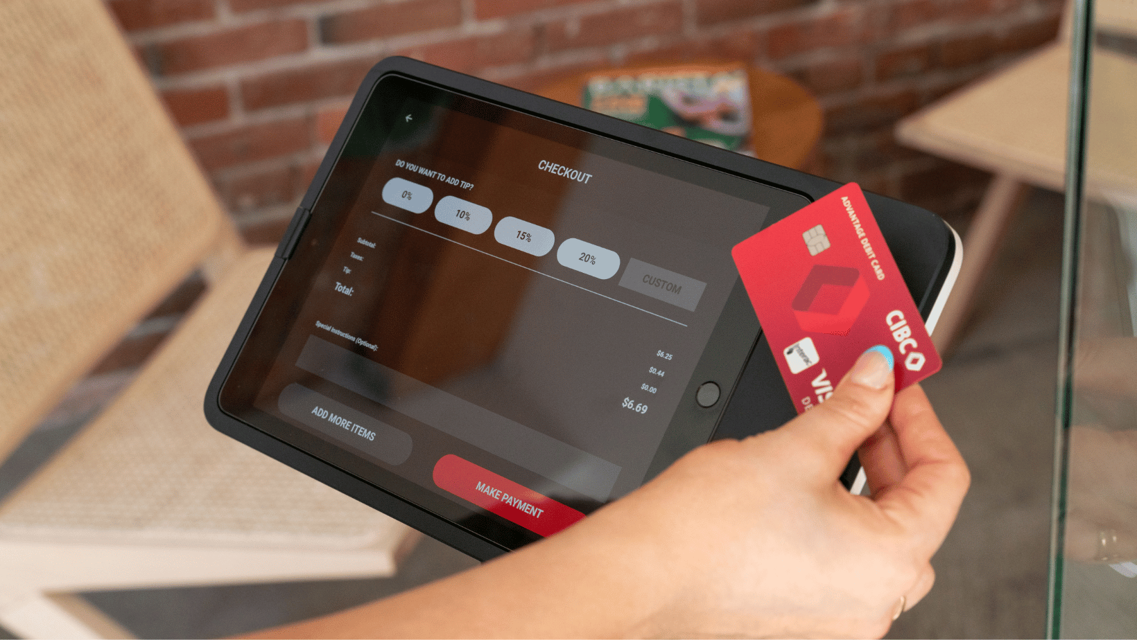 Customer paying through one of Craver's self-serve kiosk. 