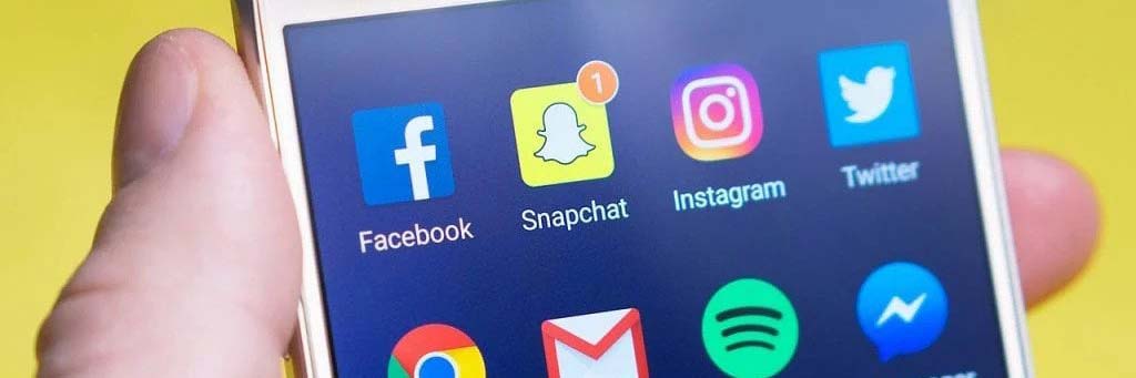 A phone with an app showing a push notification